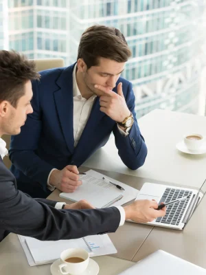 entrepreneurs_discussing_work_results_meeting entrepreneurs_discussing_work_results_meeting